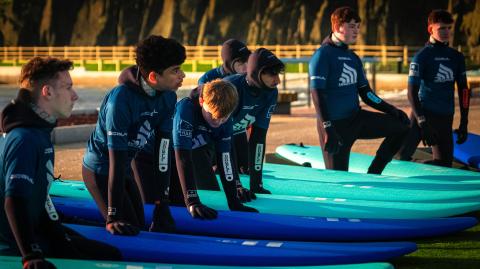 A surf class preparing prior to entering the water